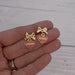 XOXO Glitter Heart Charm Bow Earrings