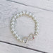 Infinity pearl stretch bracelet white