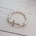 Pearl and Rhinestone Cross Stretch Bracelet