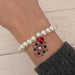 Red and Green Snowflake Pearl Bracelet