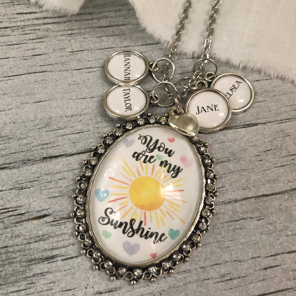 You are my sunshine glass pendant necklace with optional name charms silver tone - Kole Jax DesignsYou are my sunshine glass pendant necklace with optional name charms silver tone